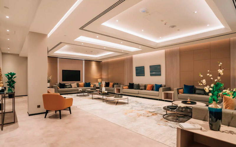 Luxurious and inviting Middle East lounge with warm and homely ambiance, exuding luxury and comfort. ExecuJet AIN 2023 FBO Survey Honors.
